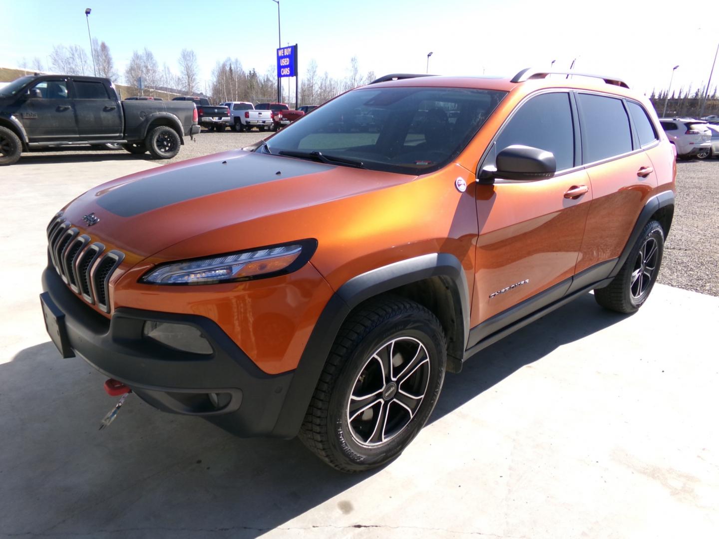 2015 orange Jeep Cherokee Trailhawk (1C4PJMBS1FW) with an 3.2L V6 DOHC 24V engine, 9-Speed Automatic transmission, located at 2630 Philips Field Rd., Fairbanks, AK, 99709, (907) 458-0593, 64.848068, -147.780609 - Photo#0